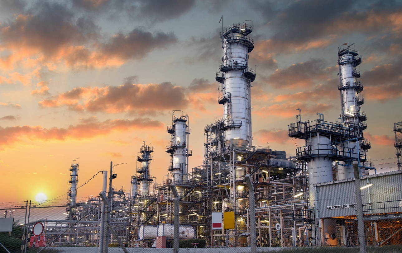 oil and gas industrial zone,the equipment of oil refining,close up of industrial pipelines of an oil refinery plant,detail of oil pipeline with valves in large oil refinery.