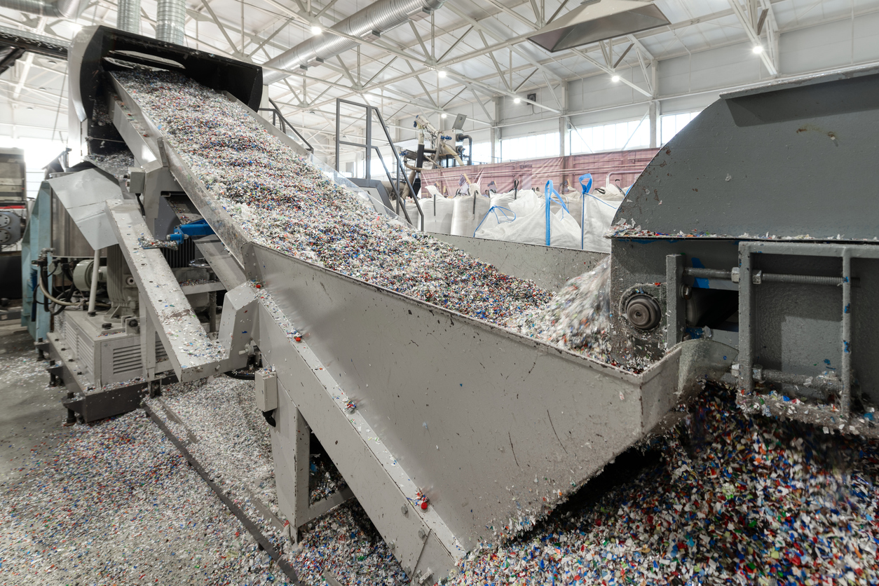 plastic recycling plant. conveyor with shredded plastic