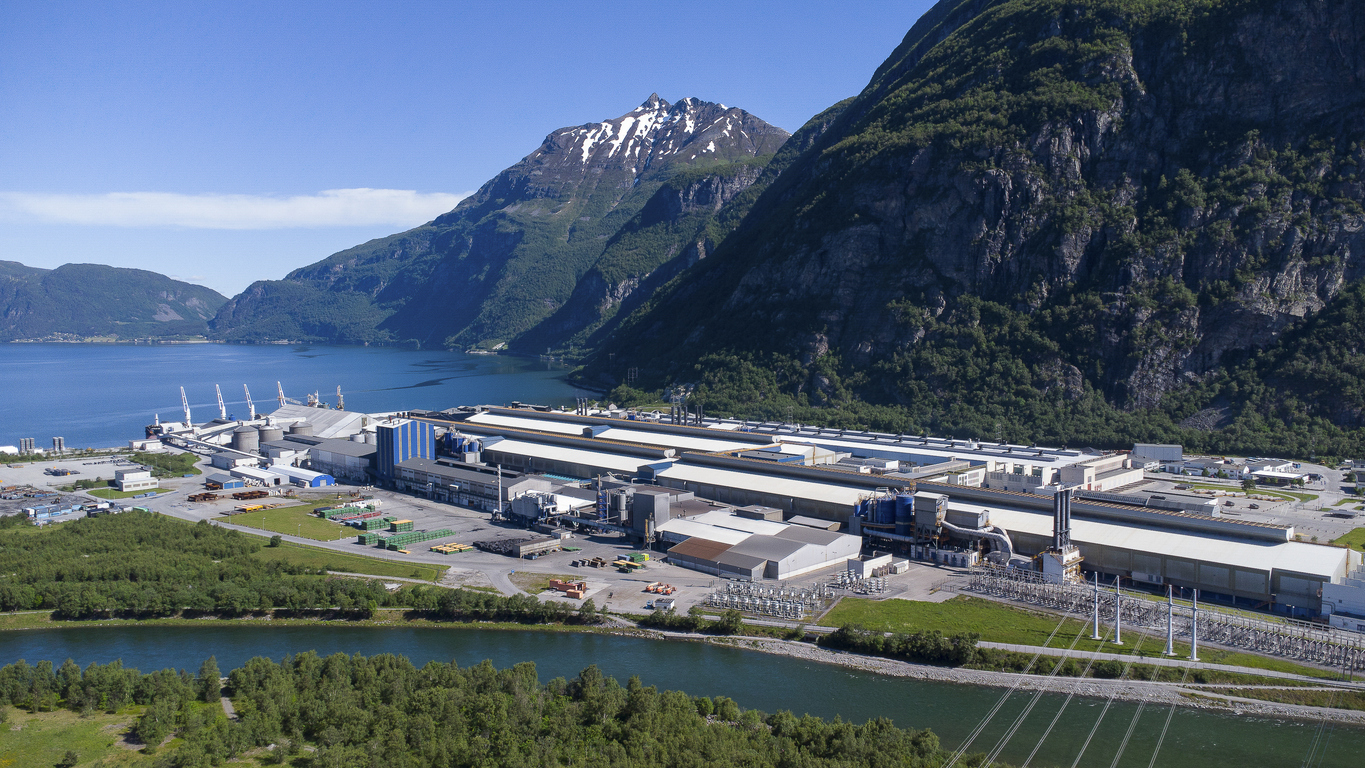 aerial view of the hydro norse aluminium production facility placed in a beautiful landscape